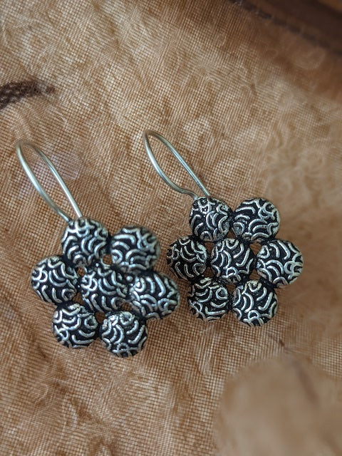 Flower shape hanging earrings oxidized