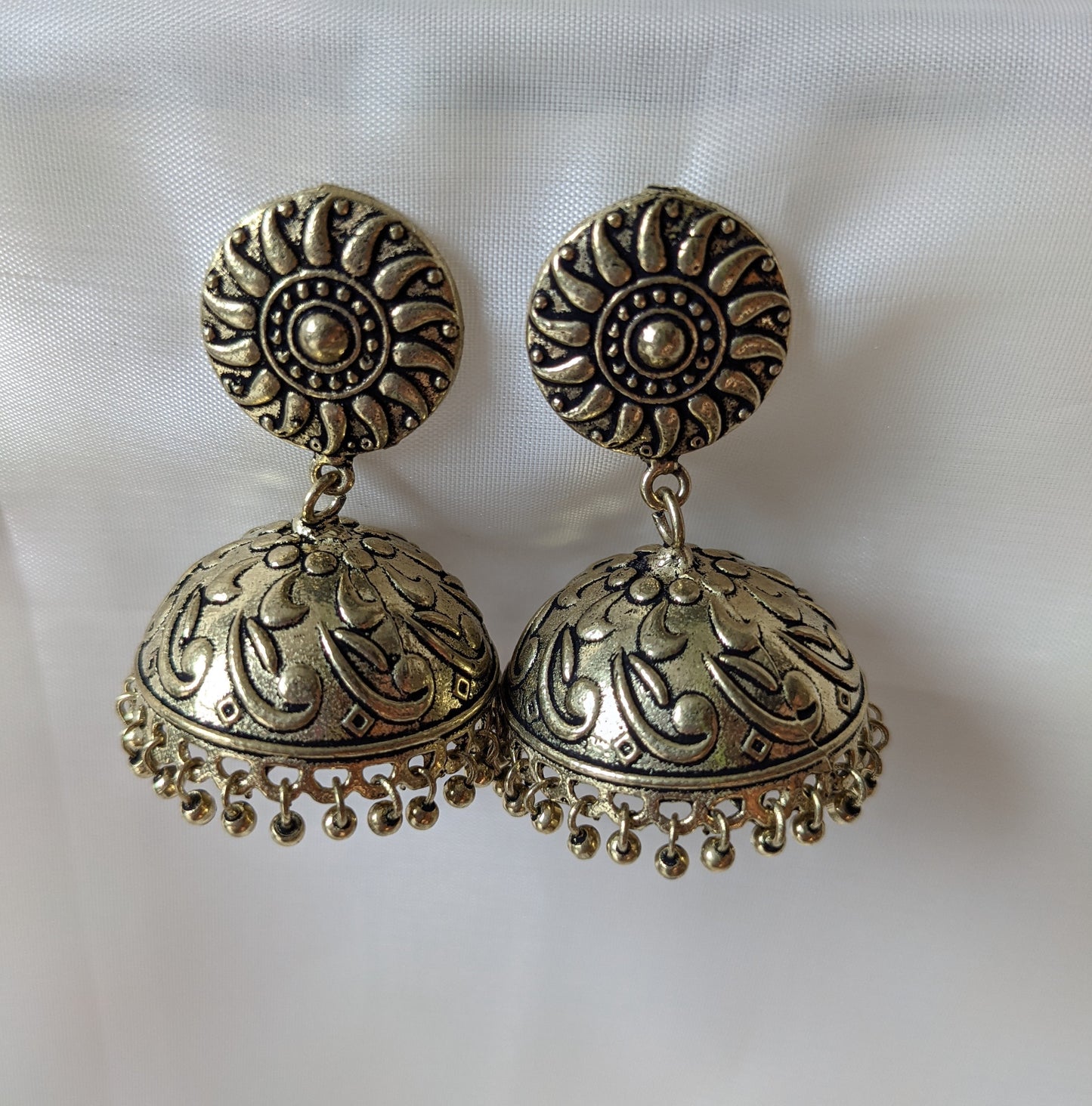 Jhumki style earrings with gorgeous raised relief details luzwithoutfrontiers.com