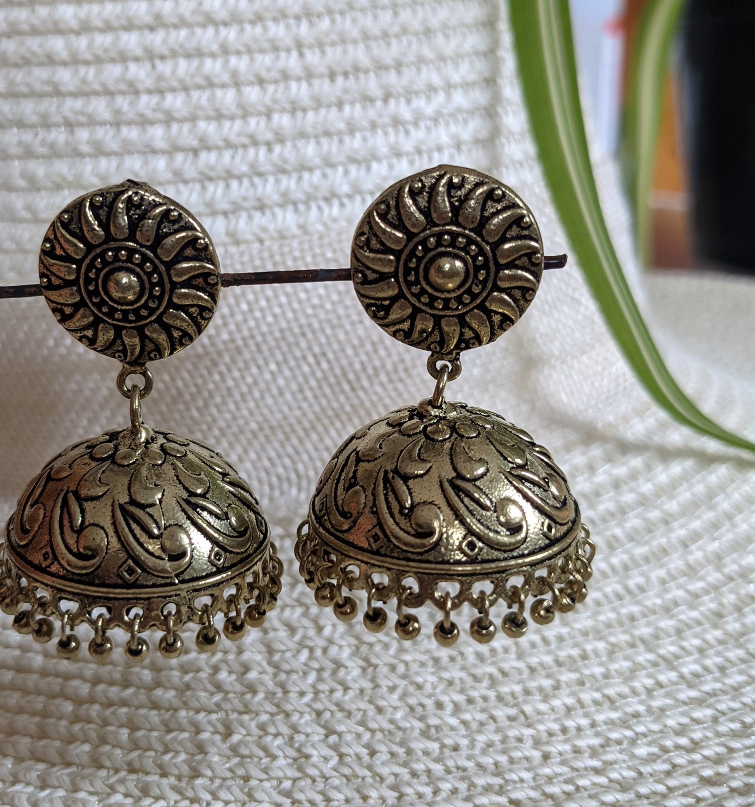 Jhumki style earrings with relief details luzwithoutfrontiers.com